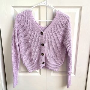 This is a sweater type thing in a light purple.